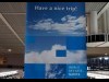 成田空港に掲げられたブランドネーム「WORLD SKY GATE_NARITA」を配したバナー