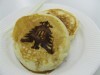 上智大学校章の焼印「パンケーキ」（関連画像）