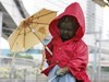 小便小僧、梅雨の装い