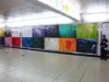 JR新宿駅構内に真空パックされた18色のポロシャツ実物ポスター