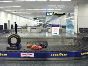 Model Race Cars on Haneda Baggage Carousels in Goodyear Japan Ad Blitz