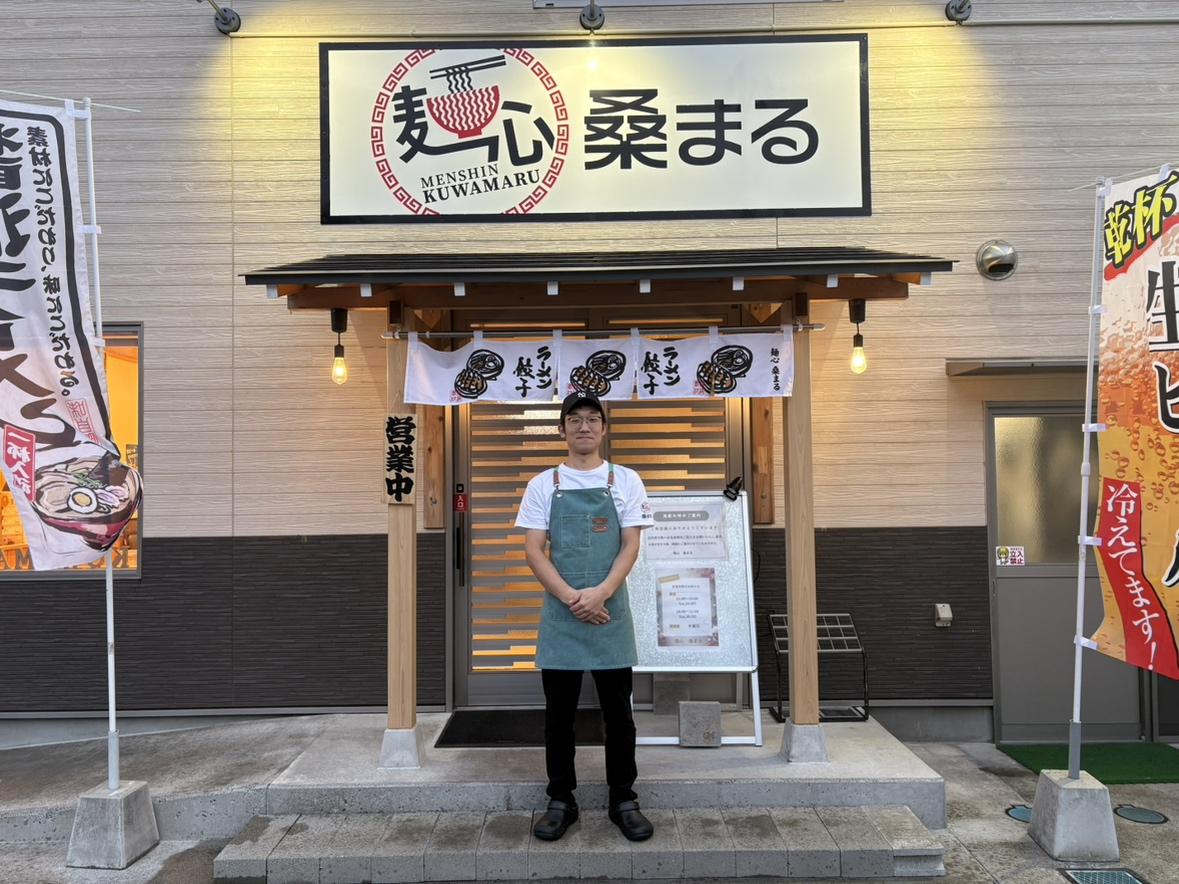 来店を呼びかける店主の桑原博士（ひろし）さん