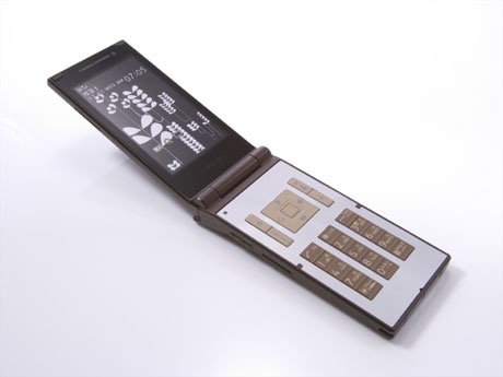 ドコモ「N705i」限定色（brownish wood）。内蔵コンテンツ、グラフィックデザインは「タイクーングラフィックス」が担当