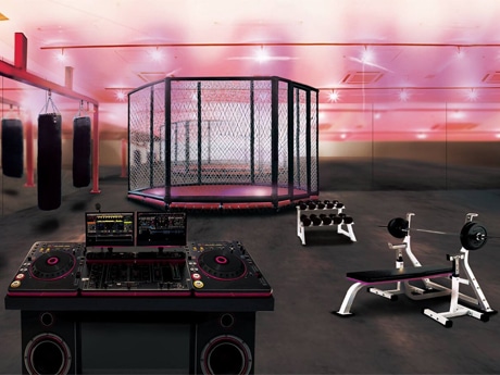 金網リングやDJブースなどを設置するジム内イメージ