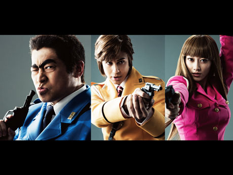 （左から）ラサール石井さん演じる両津勘吉、ユージさん演じる中川圭一、原幹恵さん演じる秋本・カトリーヌ・麗子&copy;OA/S &copy;KK 2016