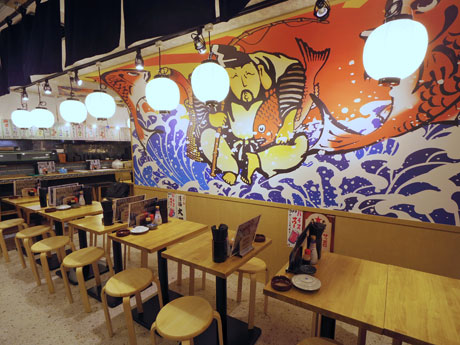 恵比寿様のイラストを掲出する店内