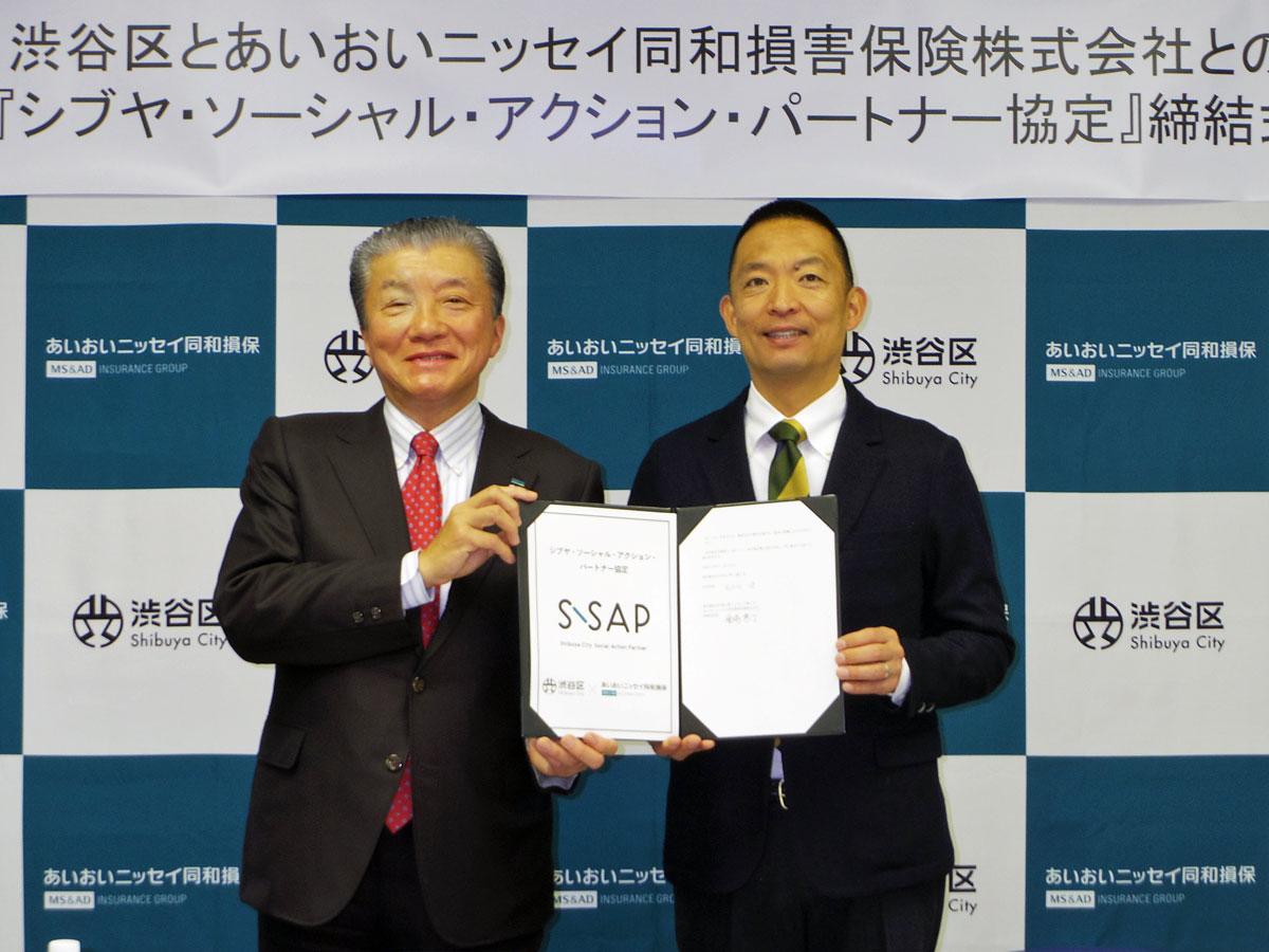 （左から）金杉恭三社長と長谷部渋谷区長