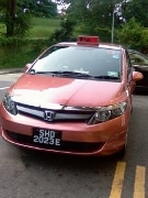 プライム・タクシー社が運行する環境にやさしいCNG方式のタクシー(写真の車種はTOYOTAのWISH)